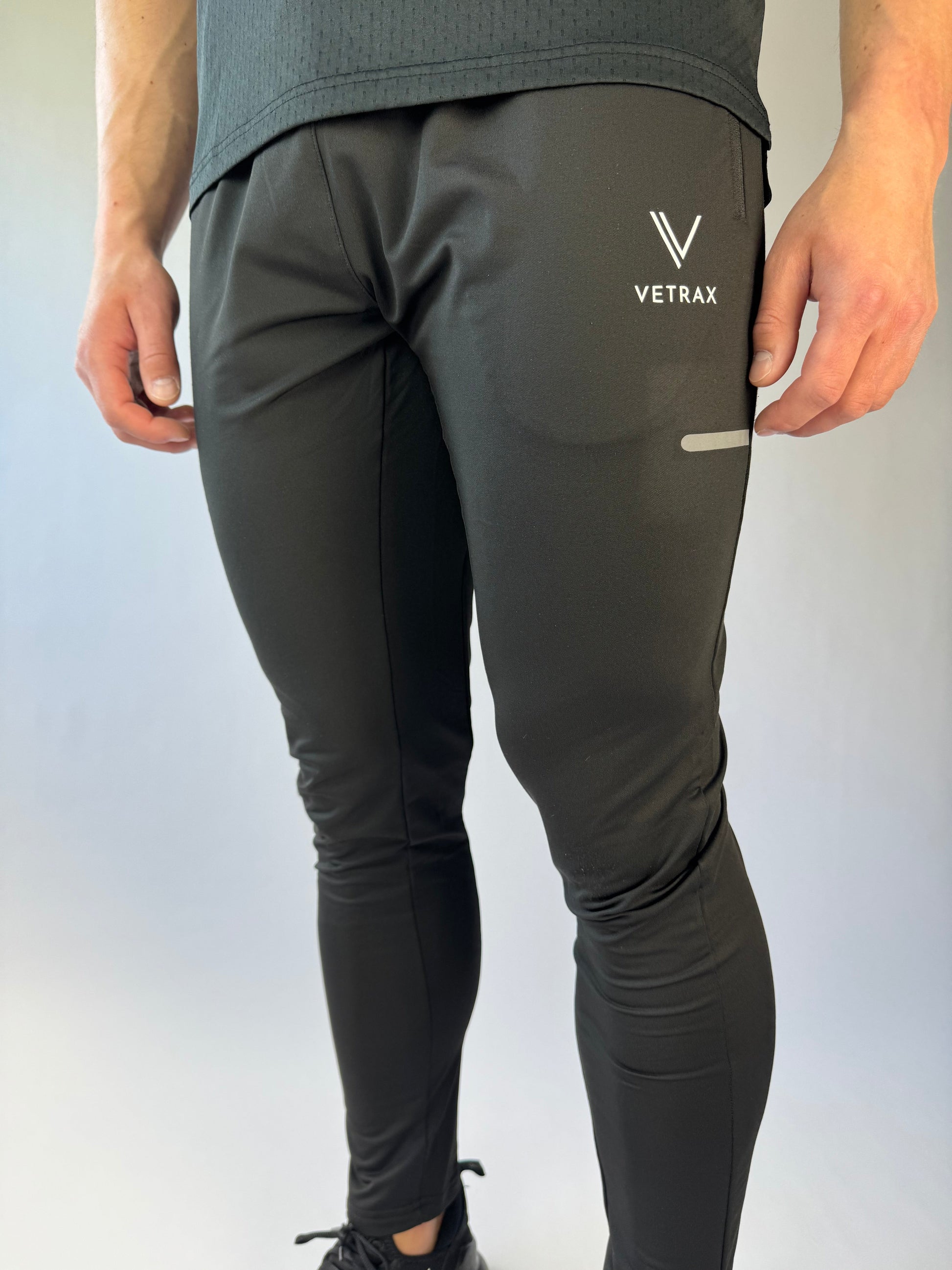 FlexMotion trainingsbroek heren in zwart met tapered fit