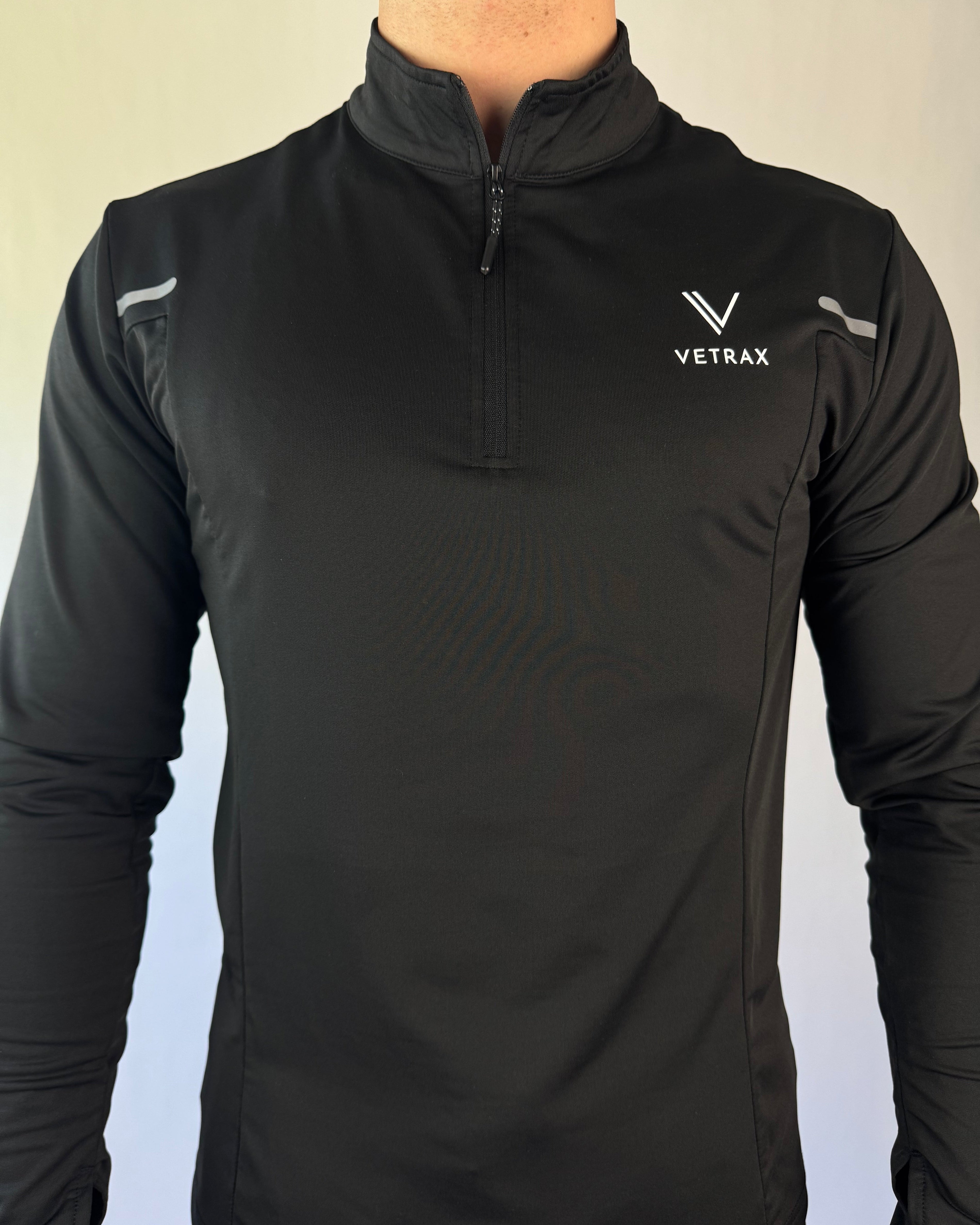 CoreZip sweater in zwart, ademend en rekbaar materiaal