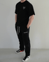 zwarte fitness outfit heren t shirt en joggingbroek moderne gym kleding set